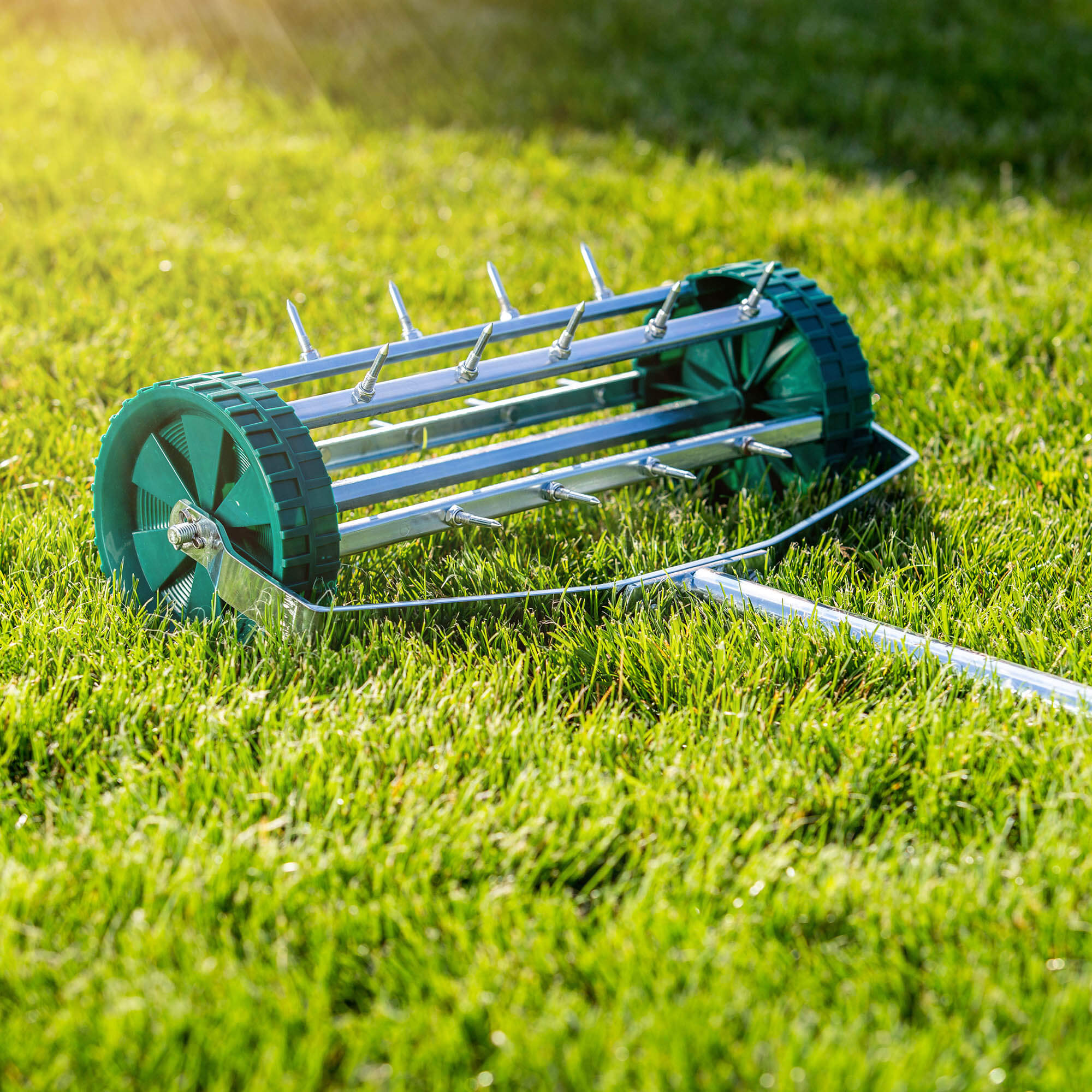Ręczny aerator do trawy Udel, zielony