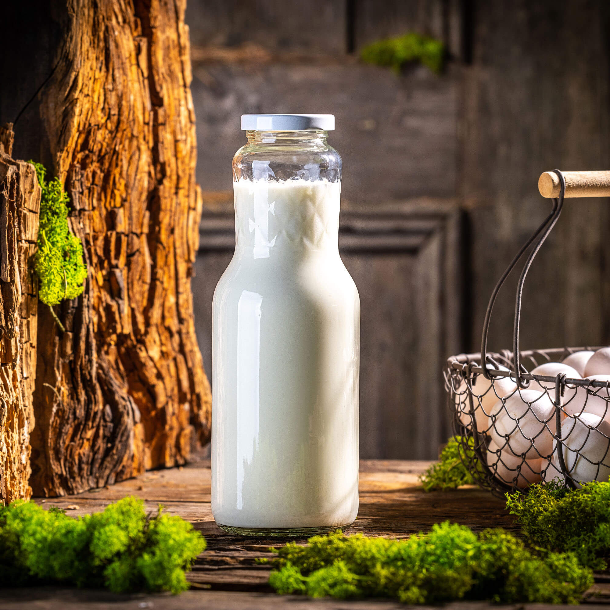 Szklana butelka na mleko Corlo 1L z białą zakrętką fi 53mm 1 szt.