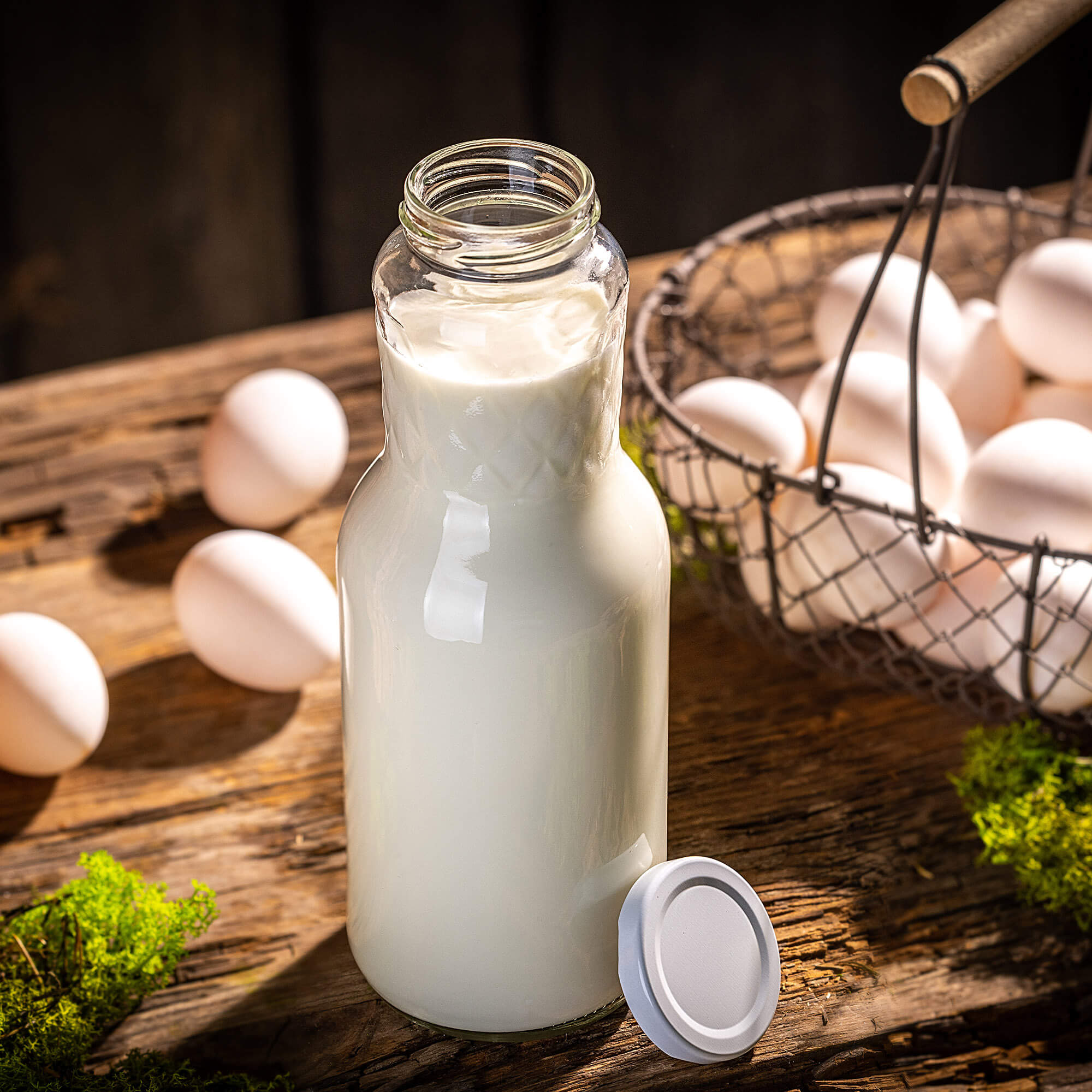 Szklana butelka na mleko Corlo 1L z białą zakrętką fi 53mm 1 szt.